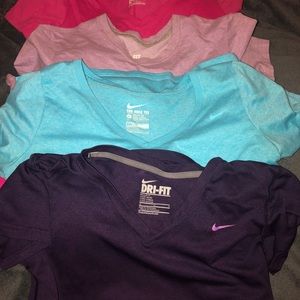 “ITS A STEAL” 4 Nike dri fit shirts
